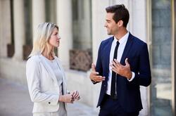 Professional communication during a job search is essential Woman and man talking