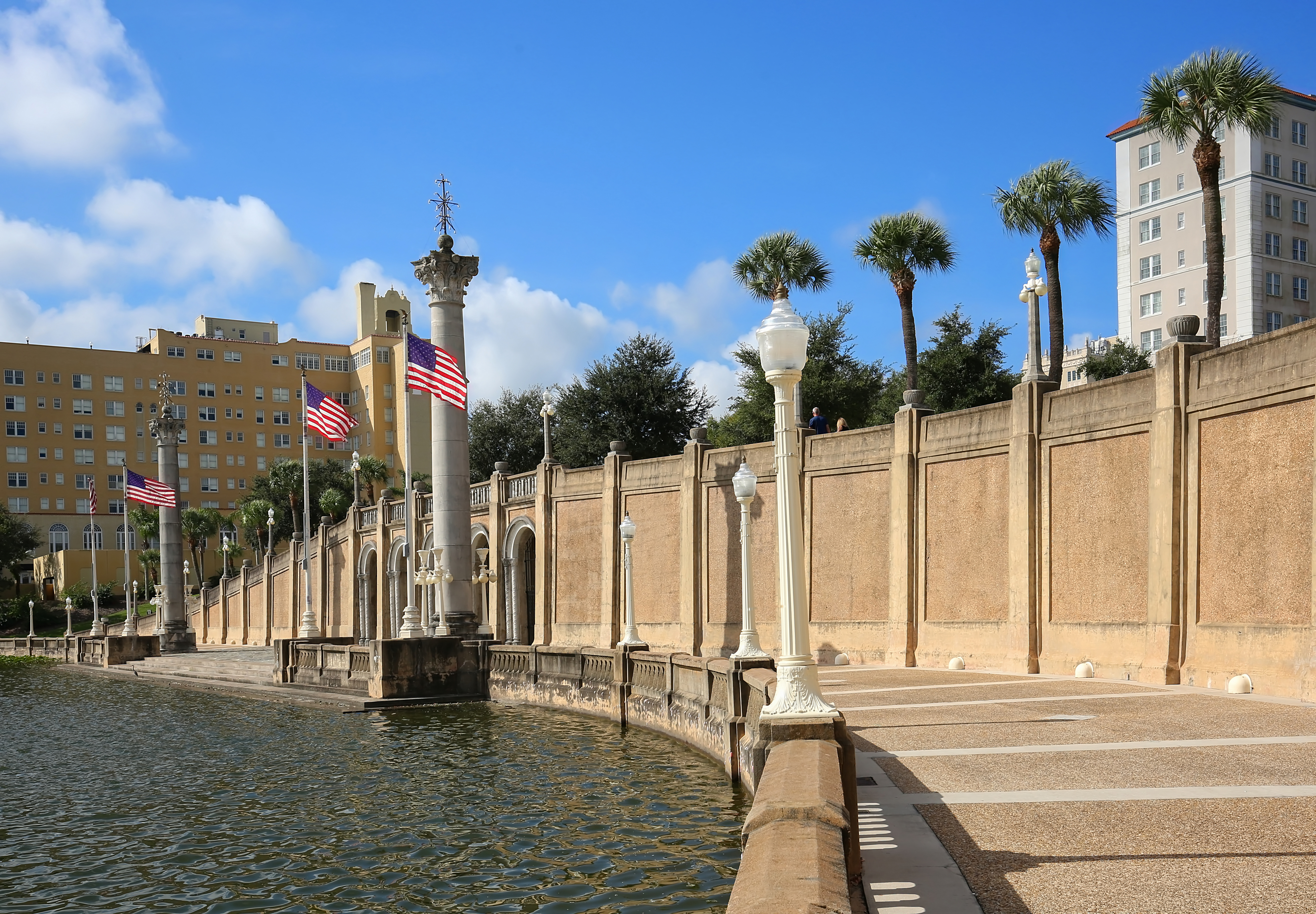 Mirror Lake Park walking path along water in downtown Lakeland, Florida.