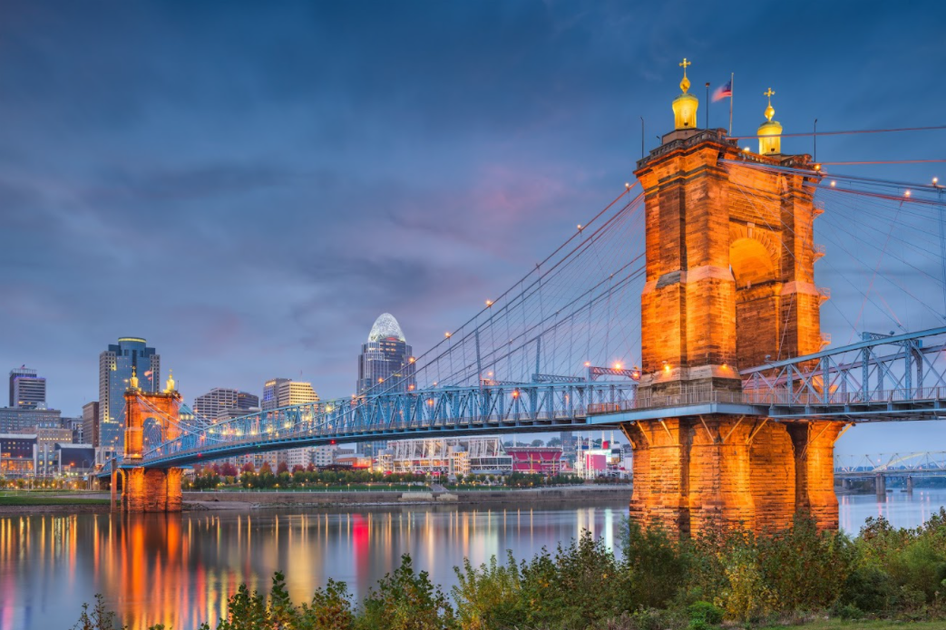 Cincinnati skyline showing and historic John A. Roebling suspension bridge across Ohio River