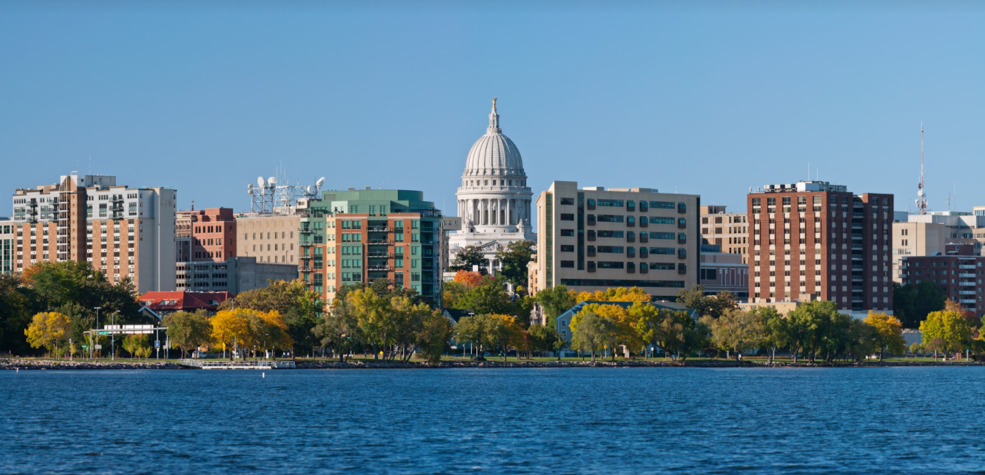 Madison Wisconson skyline and domed state capitol with lakeview.