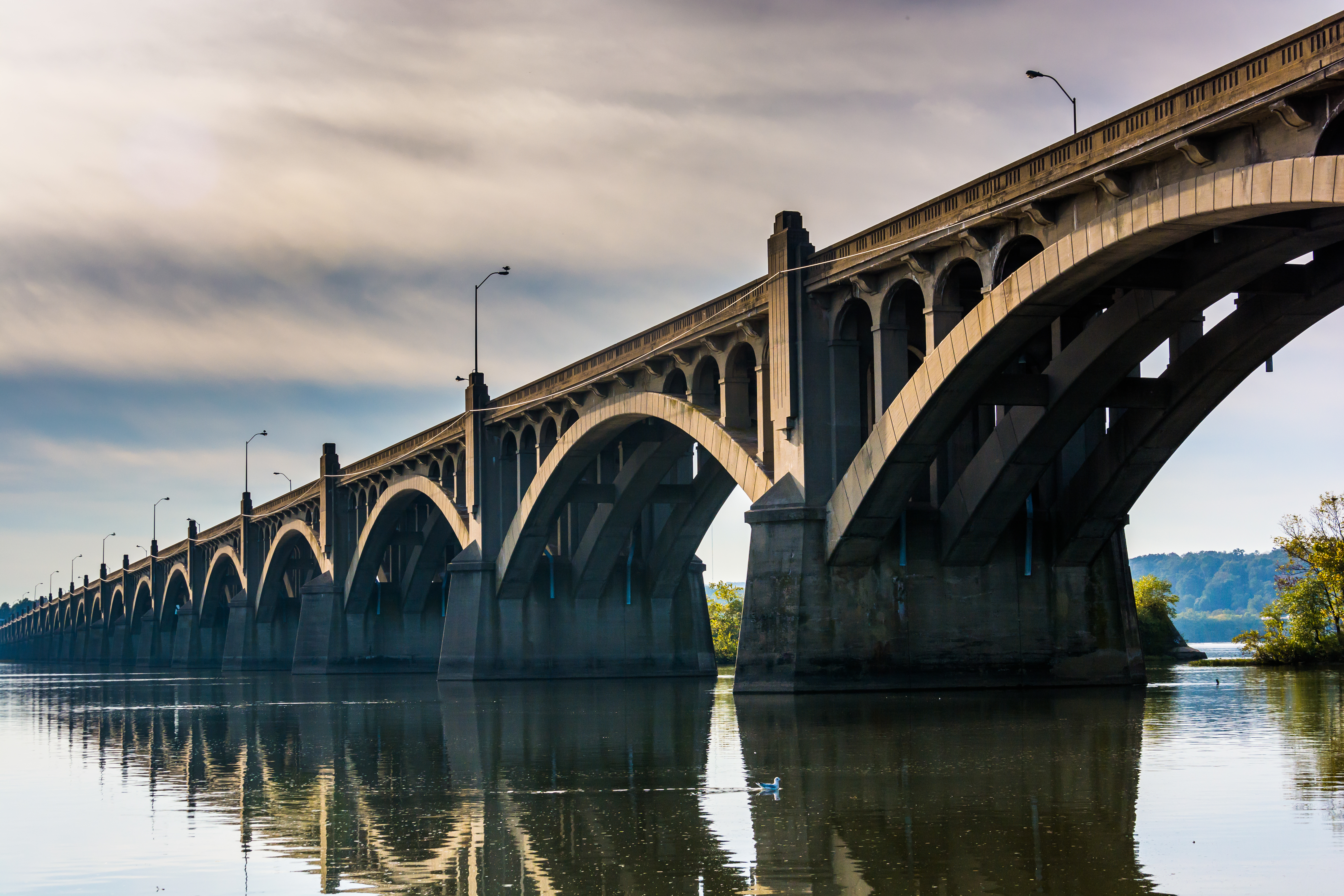 The Veterans Memorial Bridge reflecting in the Susquehanna River in Columbia, Pennsylvania