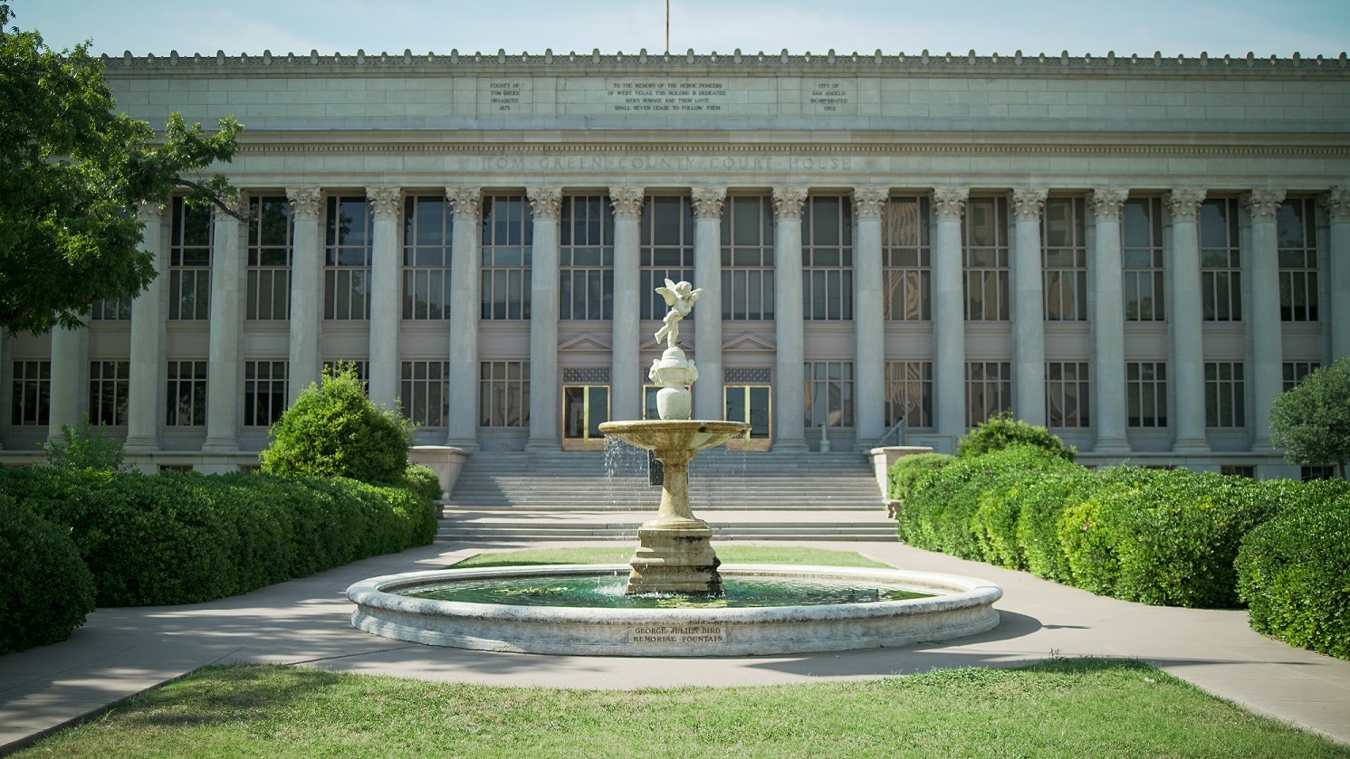 Tom Green County Courthouse with Corinthian columns and fountain