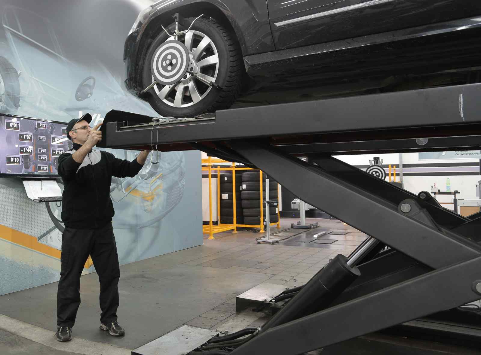 Man_working_as_machinist_on_a_car