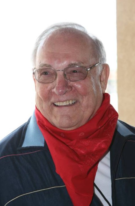 Bob Schulte wearing jacket and red scarf