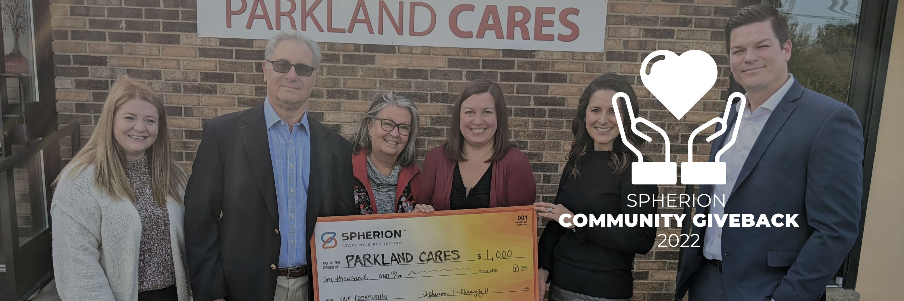 Spherion Reading (Pennsylvania) staff pose with a check for Parkland Cares