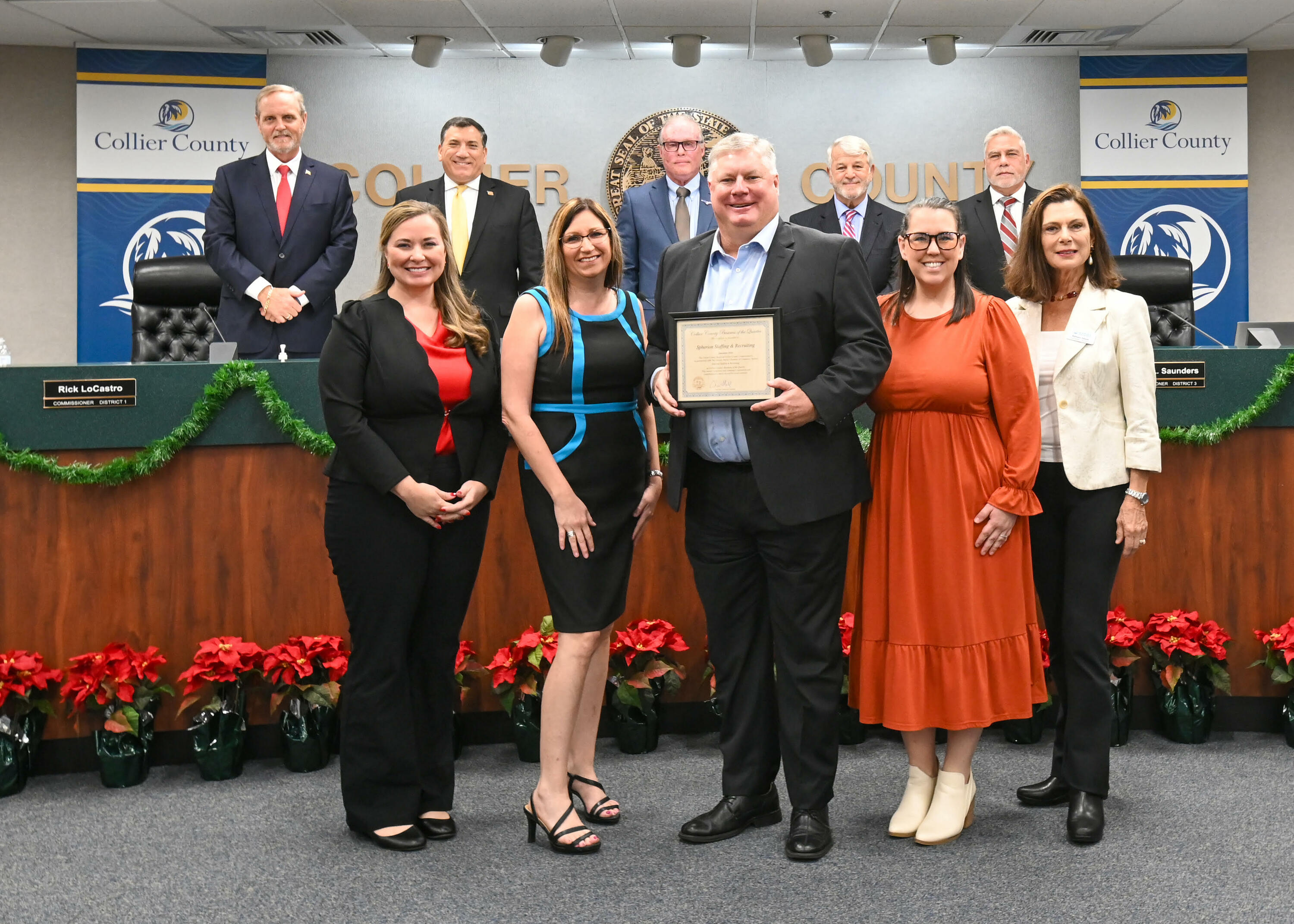 A group of Spherion professionals poses for the camera at the Greater Naples Chamber of Commerce meeting on Dec. 10, 2024
