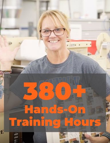 A photo of a smiling woman working in a warehouse