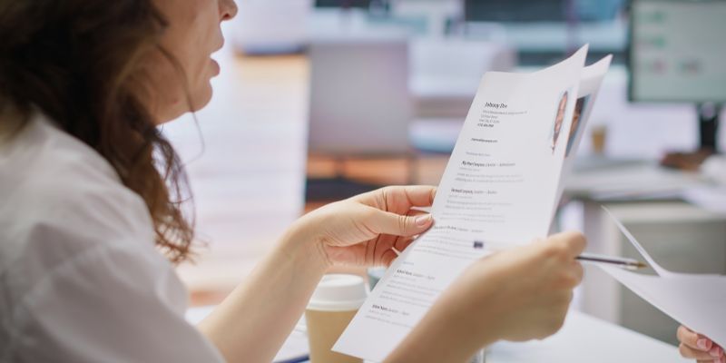 HR employers analyzing candidate CV after the job interview