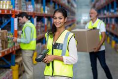 Woman_smiling_in_safety_gear
