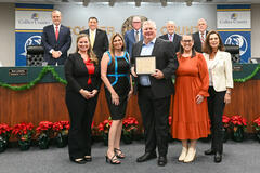 A group of Spherion professionals poses for the camera at the Greater Naples Chamber of Commerce meeting on Dec. 10, 2024