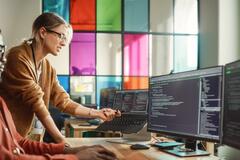 Office workers looking at data