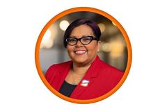 White background with a circular headshot of Kathy George