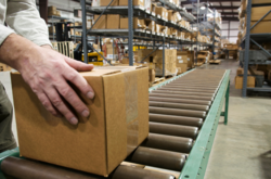 Conveyor belt with cardboard box