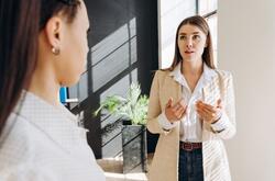 Two business women having a disagreement at work