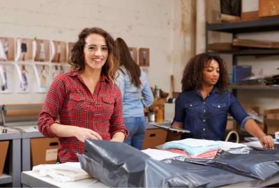 Material-handler-two-women-packages