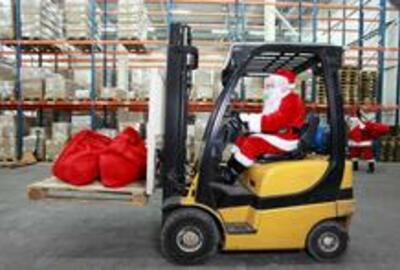 Santa driving forklift
