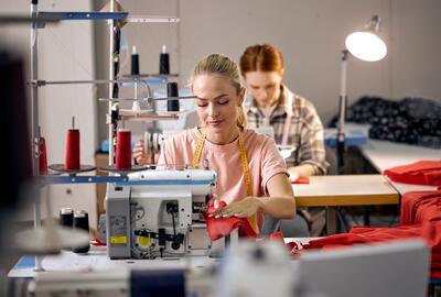 Woman at industrial sewing machine