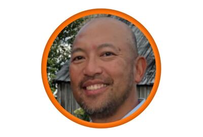 White background with a headshot in an orange frame