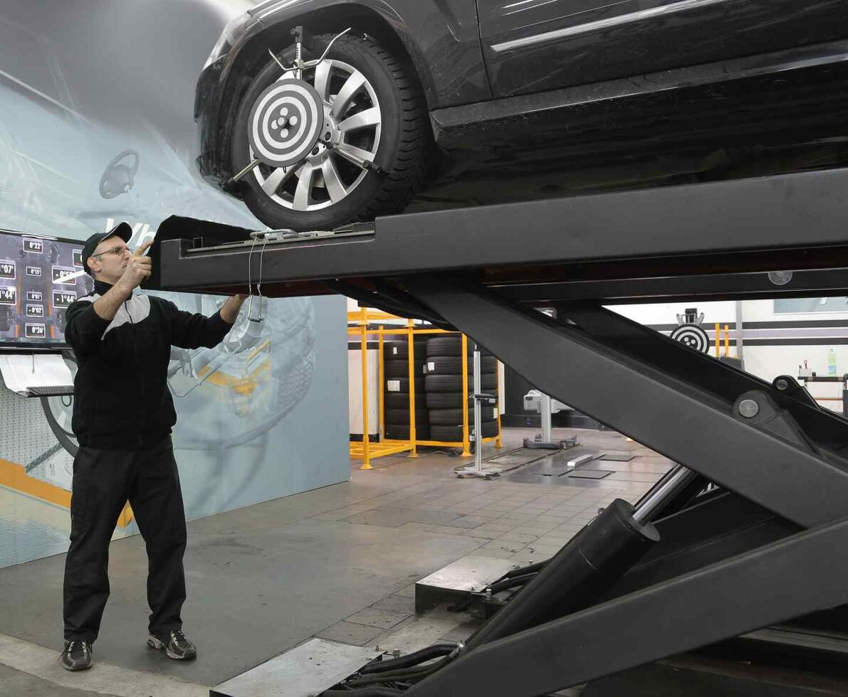 Man_working_as_machinist_on_a_car