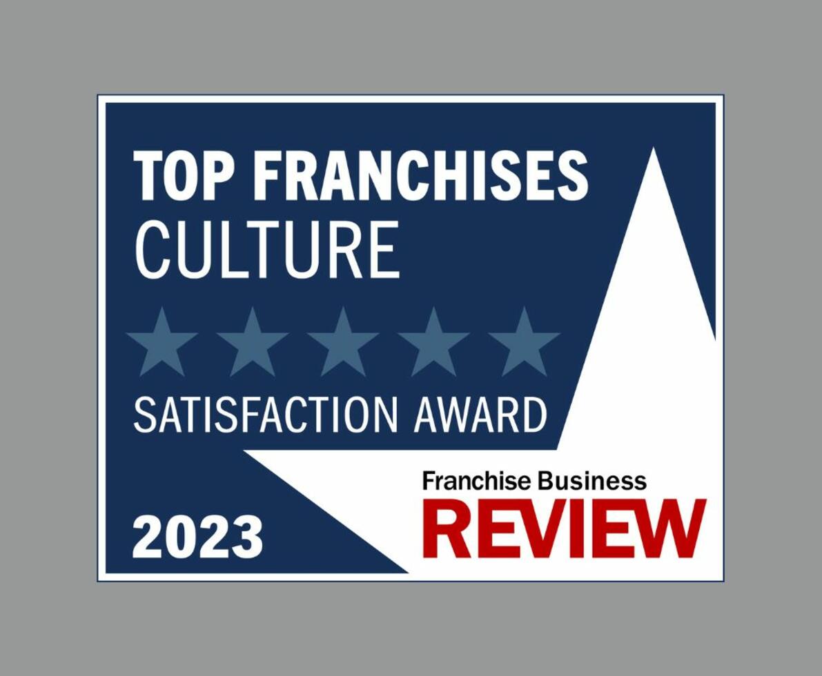 Rectangular blue and white badge with star designs and text that reads, Top Franchises Culture Satisfaction Award 2023
