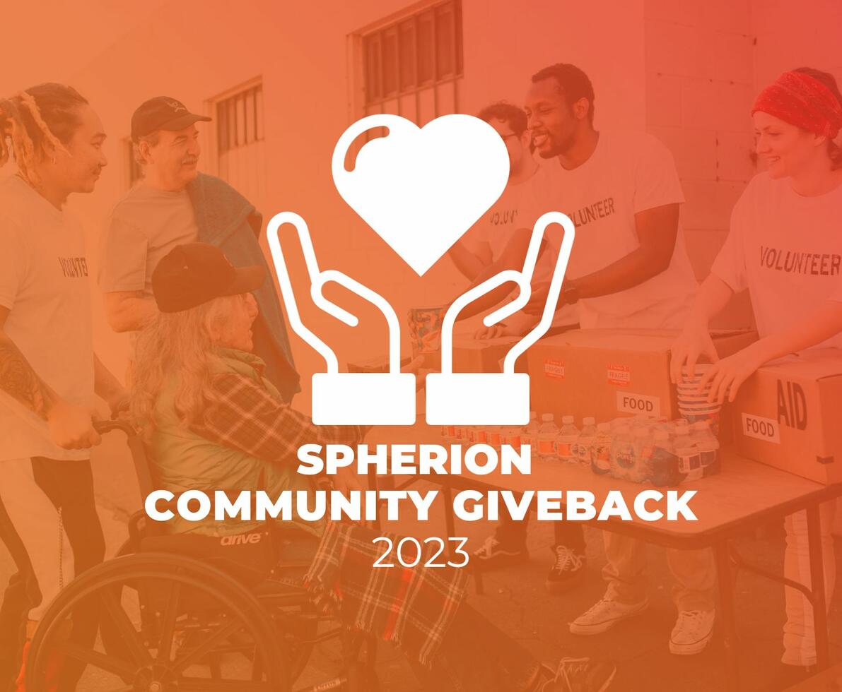 A photo of volunteers distributing food from a table. A white logo in the middle of hands holding a heart reads, Spherion Community Giveback 2023