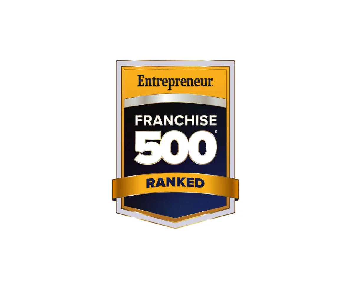 A white background with a black and gold badge that reads Entrepreneur Franchise 500 Ranked