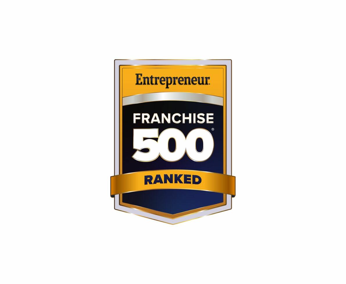 A white background with a black and gold badge that reads Entrepreneur Franchise 500 Ranked