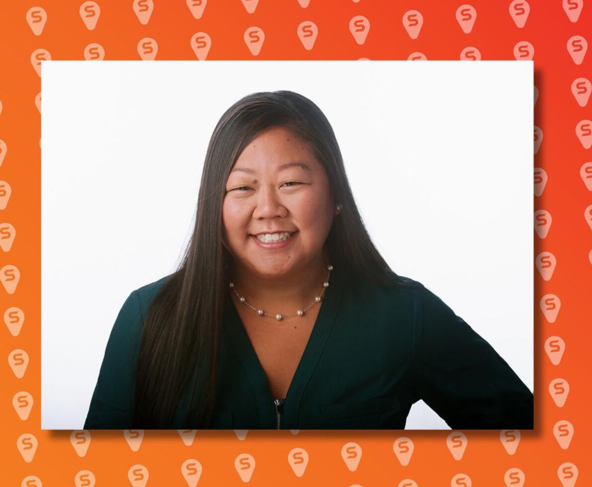 Courtney Vossekuil against an orange background