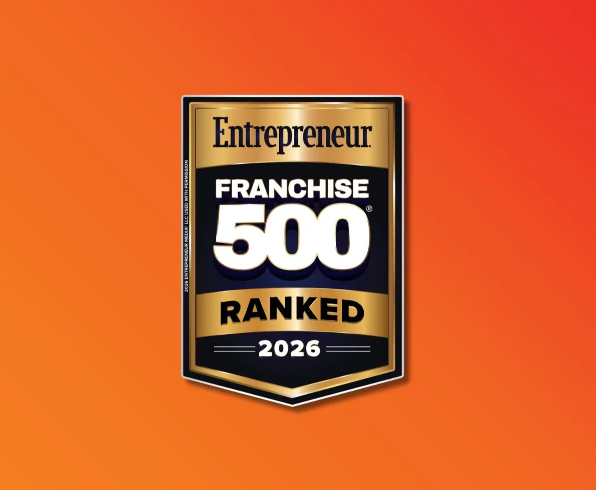 Orange background with a gold, black and white Entrepreneur 500 badge