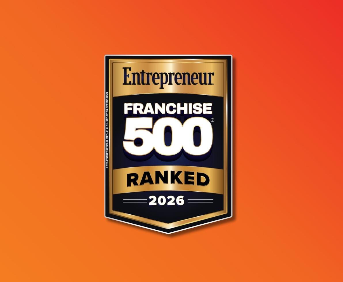 Orange background with a gold, black and white Entrepreneur 500 badge