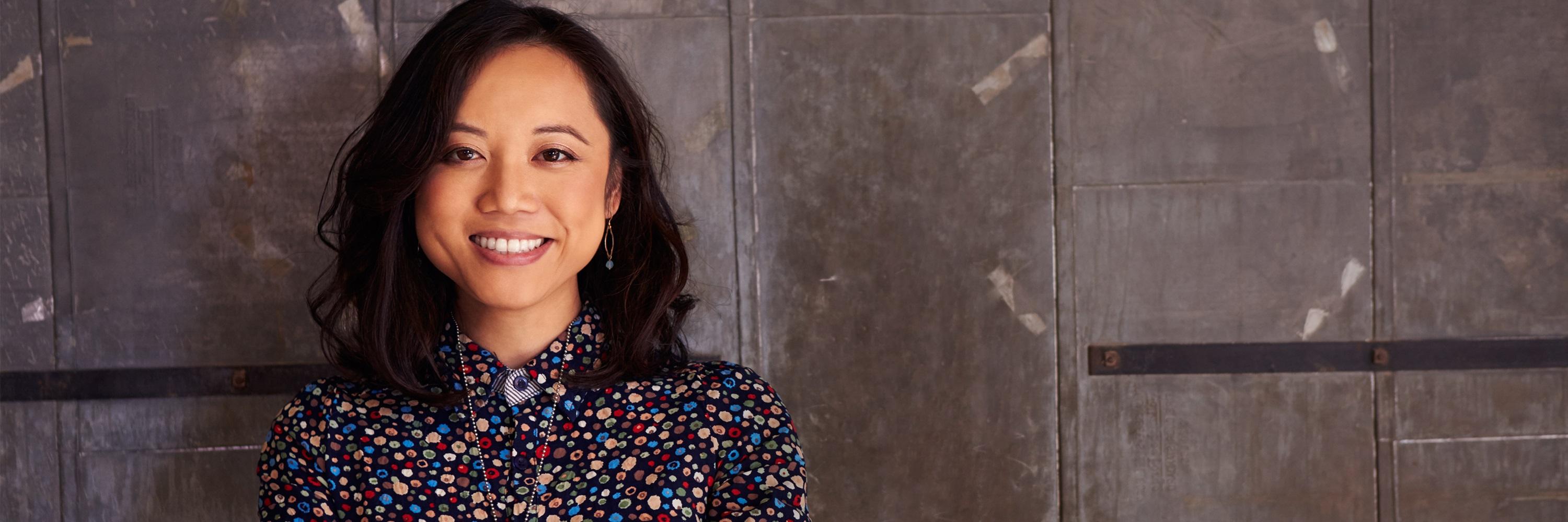 Asian American Woman Smiling at the camera