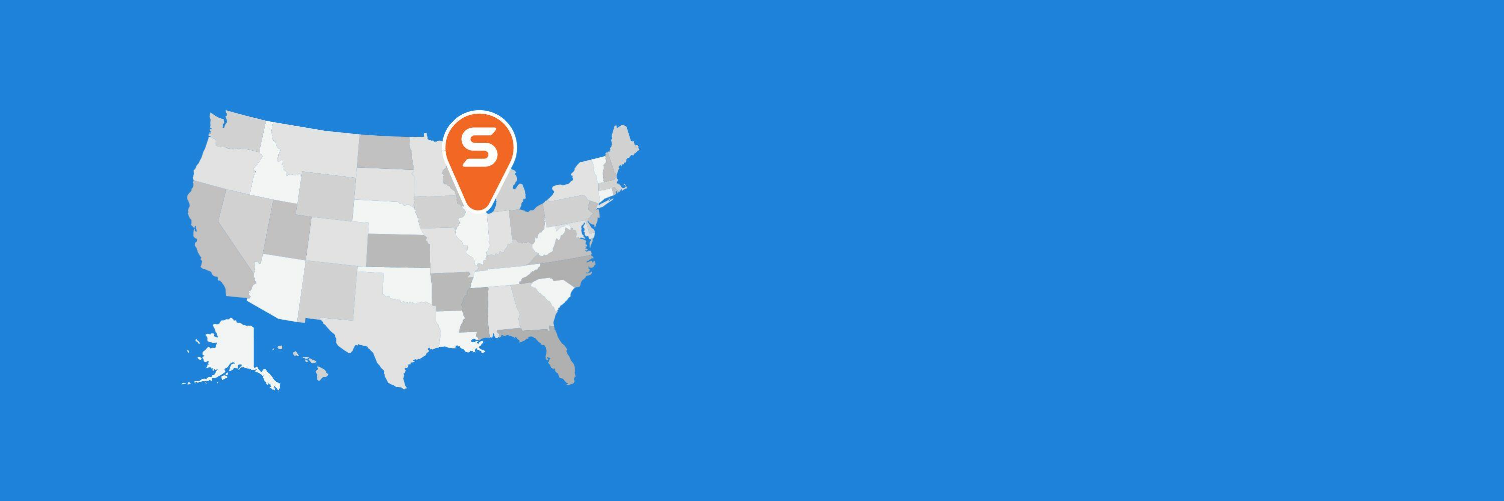 A blue background with a gray and white map of the USA featuring an orange waypoint situated over Illinois