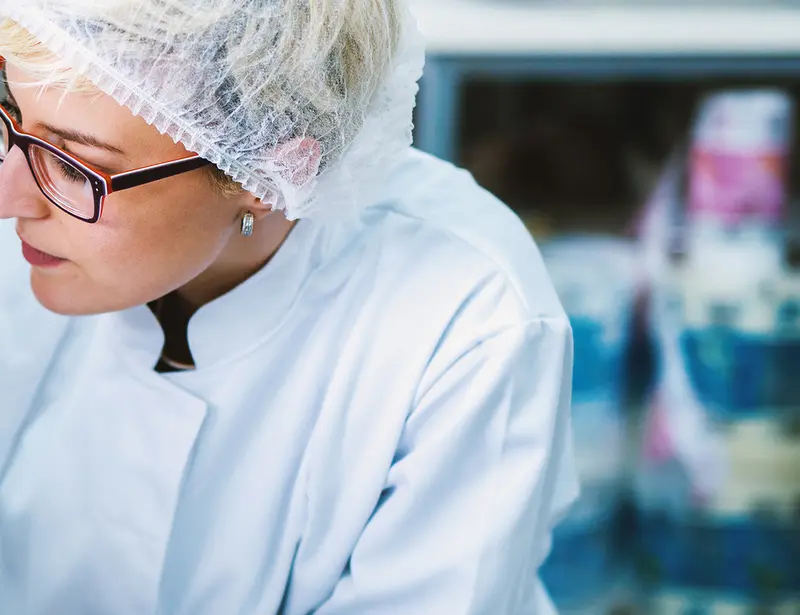 Lab technician reviewing labels