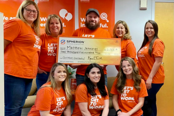 Matthew Jennings poses with his check and members of Spherion's North Dartmouth, Massachusetts office Matthew Jennings poses with his check and members of Spherion's North Dartmouth, Massachusetts office