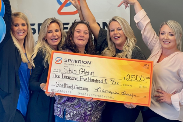 Staci Glenn poses with her $2500 check and members of Spherion's West Monroe, Louisiana office