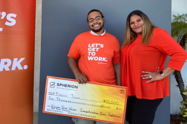 Treyvon Towns poses with his grand prize $10,000 check and Deborah Figueroa, client services specialist at Spherion's Port Saint Lucie, Florida office Treyvon Towns poses with his grand prize $10,000 check and Deborah Figueroa, client services specialist at Spherion's Port Saint Lucie, Florida office