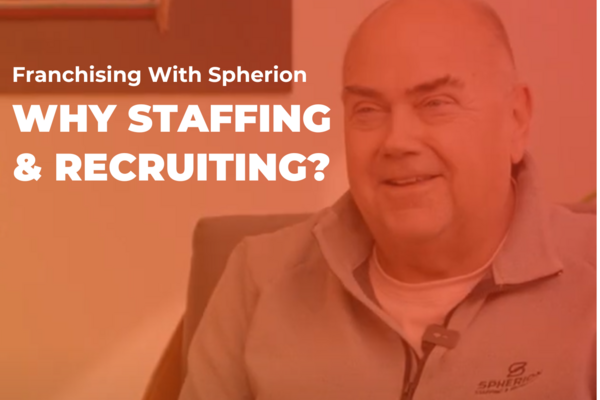 Orange tinted photo of a man smiling with the words Franchising with Spherion Why Staffing and Recruiting?