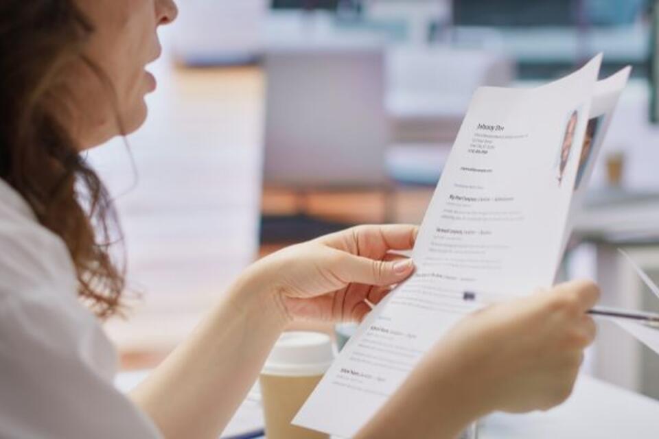 HR employers analyzing candidate CV after the job interview